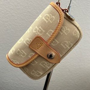 Dooney and Bourke wristlet with original leather strap EUCcream,natural leather